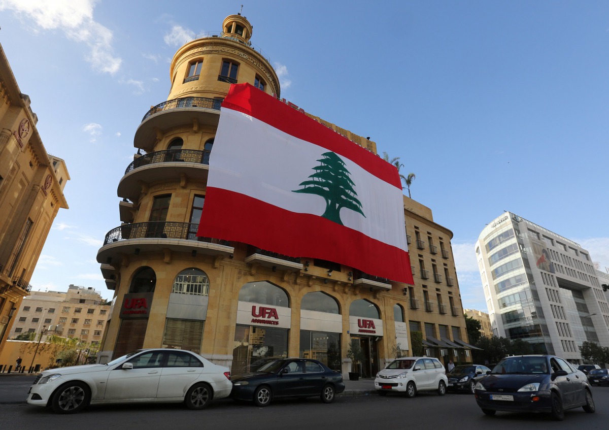 A Lebanese flag hangs from a building in downtown Beirut, Lebanon, November 21, 2017. Reuters/ Aziz Taher