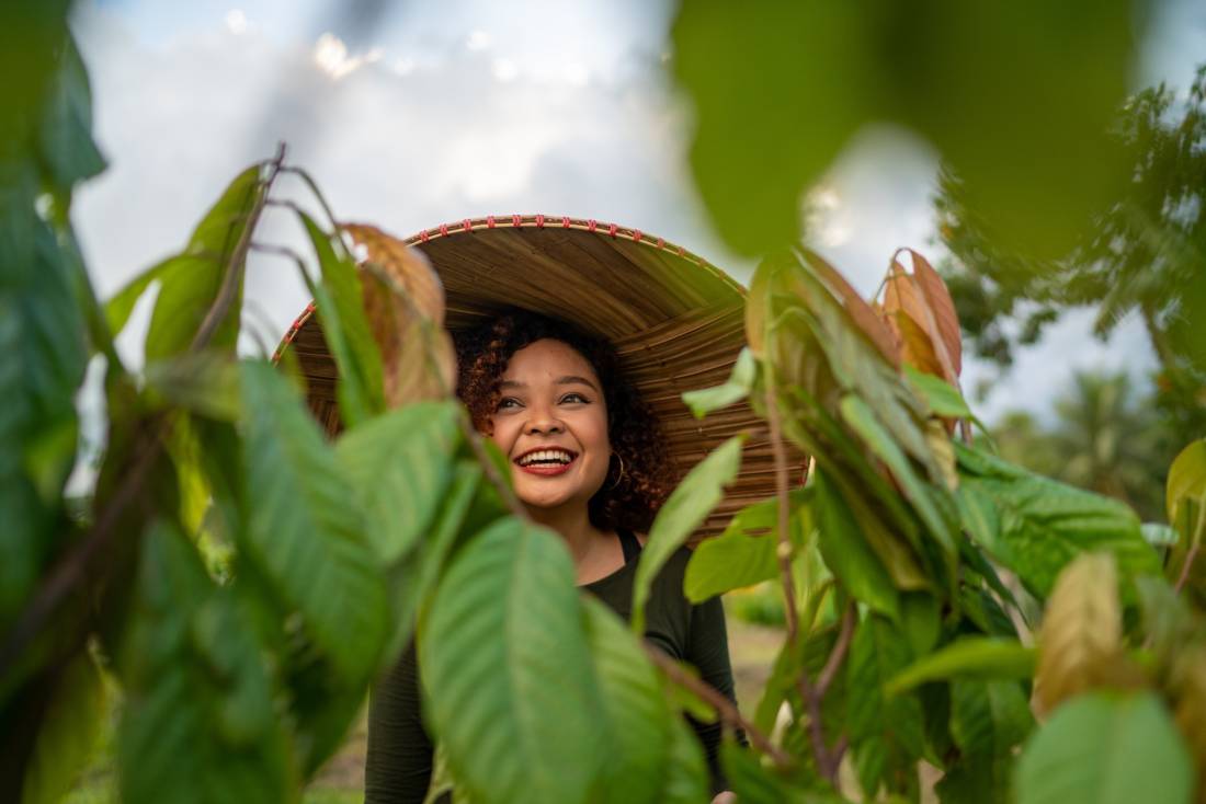 The Cacao Project founder Louise Mabulo visits a farm in in San Fernando, Camarines Sur, the Philippines, on July 25, 2019. (UN Environment Programme photo) 