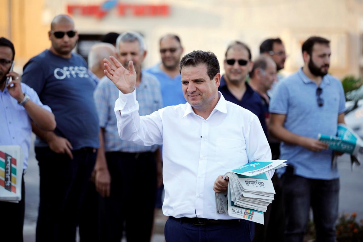 Ayman Odeh, leader of the Joint List, gestures as he hands out pamphlets during an an election campaign event in Tira, northern Israel September 5, 2019. Reuters/Amir Cohen