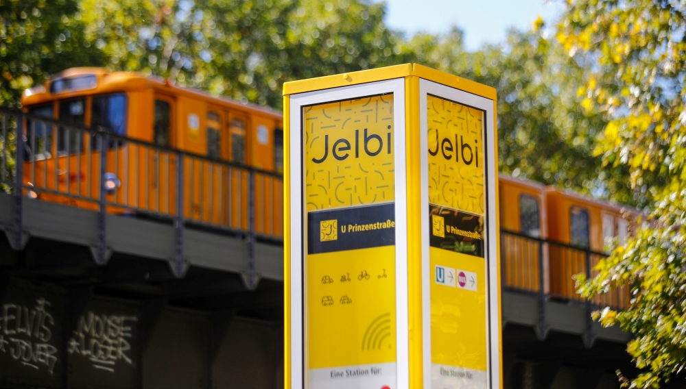 A subway train passes a column of a Jelbi-Station in Berlin, Germany September 22, 2019. Picture taken September 22, 2019. REUTERS/Hannibal Hanschke