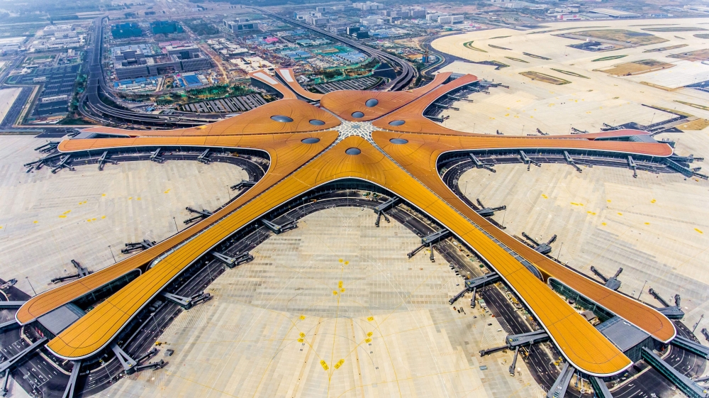 (FILES) This file photo taken on June 28, 2019 shows the terminal of the new Beijing Daxing International Airport. A futuristic new airport in Beijing, which is expected to become one of the busiest in the world, was opened by President Xi Jinping on Sept