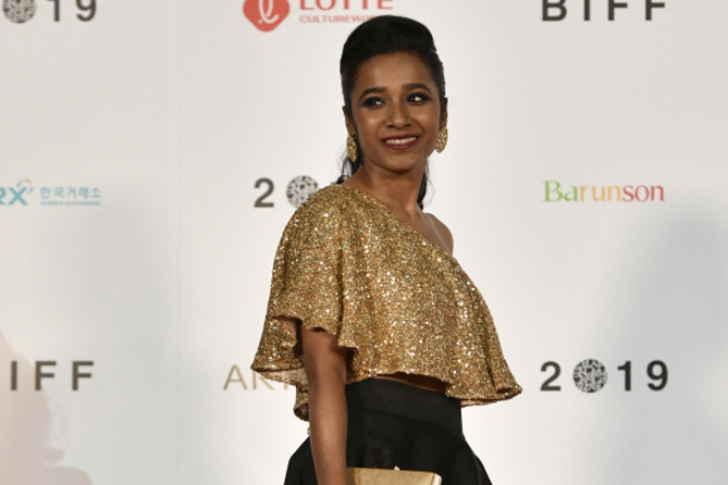Indian film actress Tannishtha Chatterjee walks on the red carpet during the opening ceremony of the Busan International Film Festival (BIFF) at the Busan Cinema Center in Busan on October 3, 2019. AFP / Jung Yeon-je