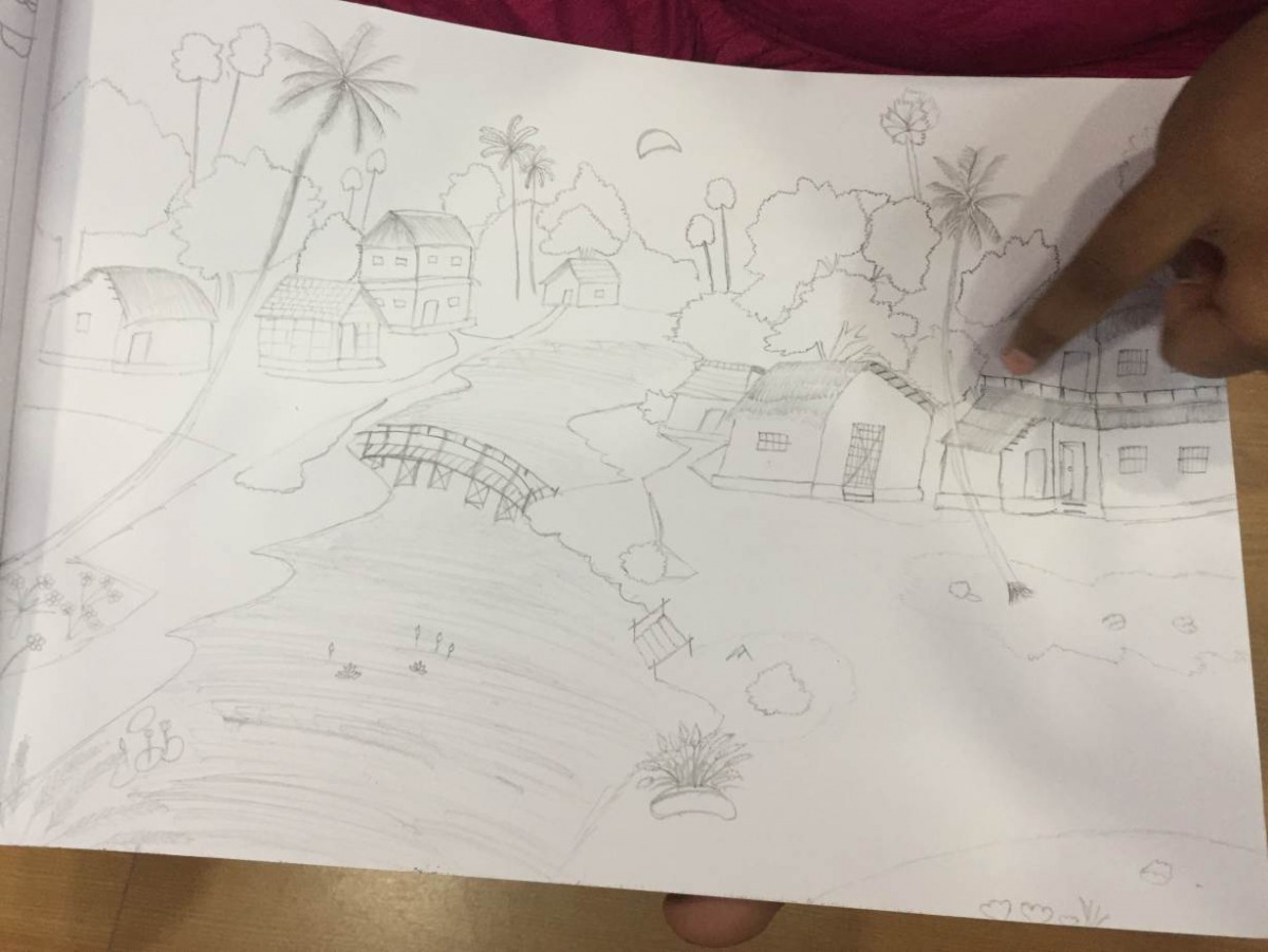 A Bangladeshi trafficking survivor shows a drawing she has made of her house at a shelter in West Bengal, India, Sept 9, 2019. Thomson Reuters Foundation/Roli Srivastava