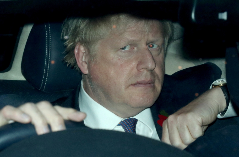 Britain's Prime Minister Boris Johnson arrives to the Houses of Parliament in London, Britain, October 28, 2019. REUTERS/Hannah McKay 