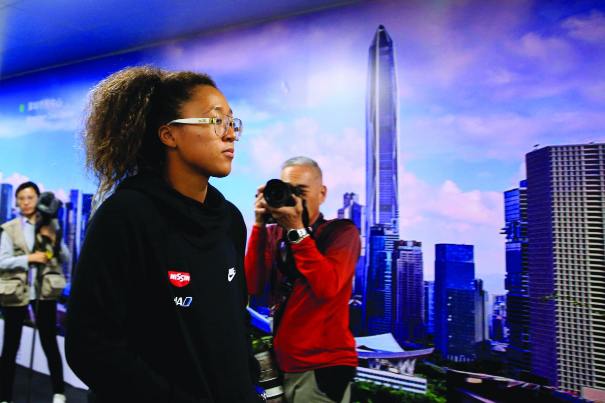 Japan's Naomi Osaka leaves after a news conference. Reuters/Aly Song