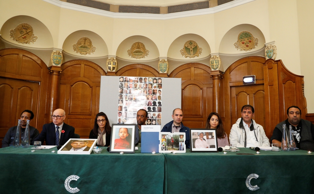 Families affected by the Grenfell Tower fire speak during a news conference in London, Britain October 30, 2019. REUTERS/Peter Nicholls 
