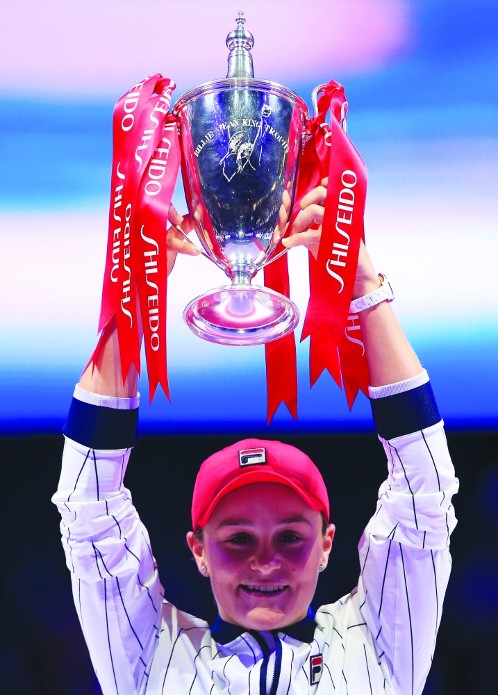 Australia's Ashleigh Barty poses with a trophy as she celebrates after winning the final against Ukraine's Elina Svitolina.Reuters/Aly Song