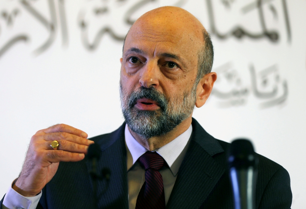 Prime Minister Omar al-Razzaz speaks to the media during a news conference in Amman, Jordan April 9, 2019. Reuters/Muhammad Hamed
 