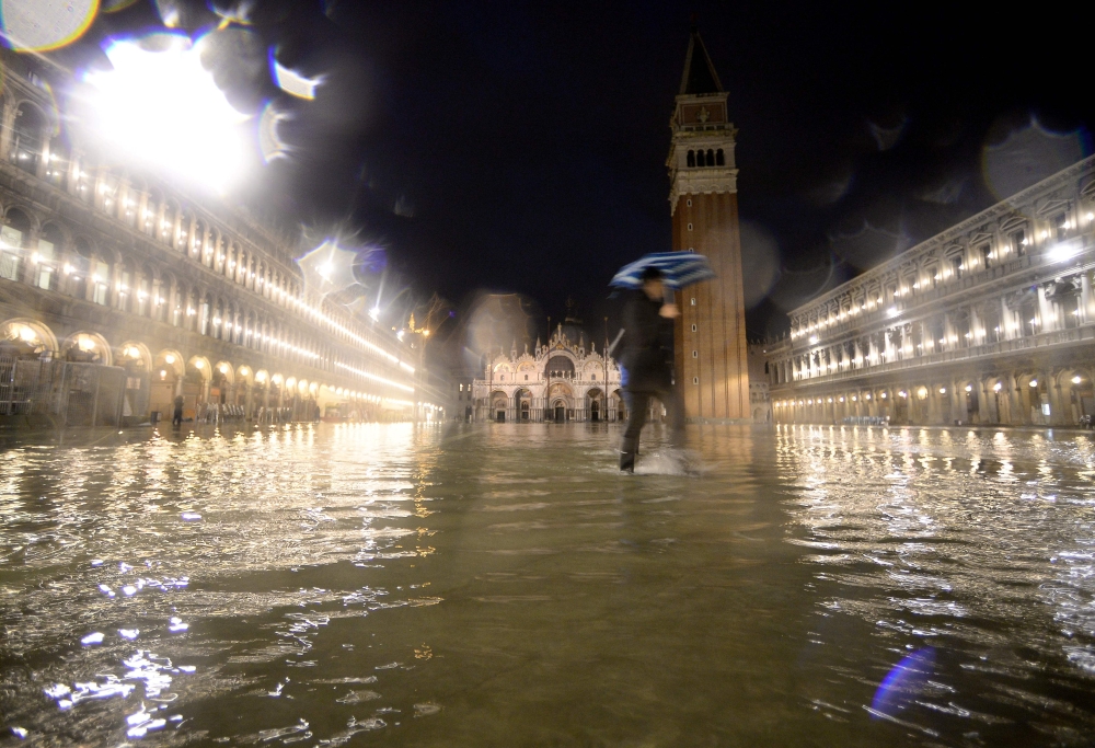 A general view shows the flooded St. Mark's Square, with St. Mark's Basilica (Rear L) and the Bell Tower on November 15, 2019 in Venice, two days after the city suffered its highest tide in 50 years. Flood-hit Venice was bracing for another exceptional hi