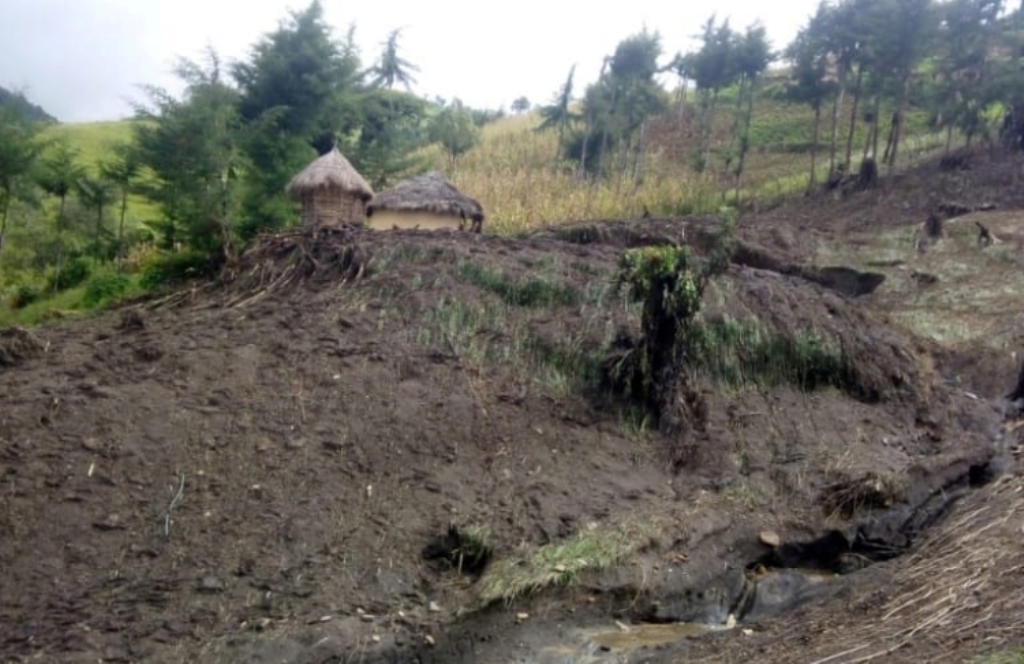 Houses are seen covered by mud after heavy rains caused landslides in the village of Parua, West Pokot County, Kenya November 23, 2019. Picture taken November 23, 2019. REUTERS/Moses Lokeris