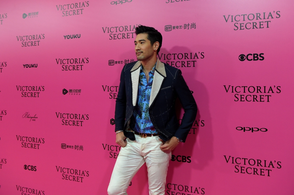 (FILES) In this file photo taken on November 20, 2017 Canadian actor Godfrey Gao a.k.a. Godfrey Tsao poses on the 