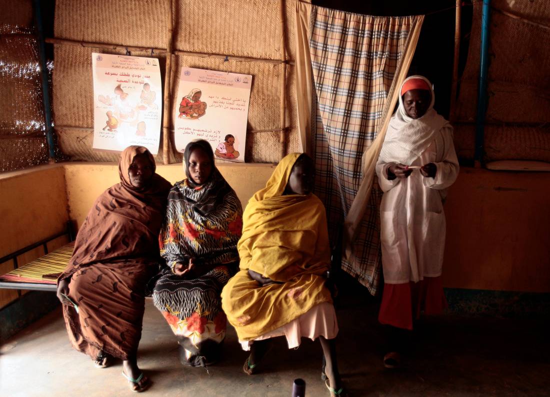 Sudanese women wait to consult a doctor at a maternity clinic in Al Fasher, northern Darfur, March 16, 2009. Reuters/Zohra Bensemra