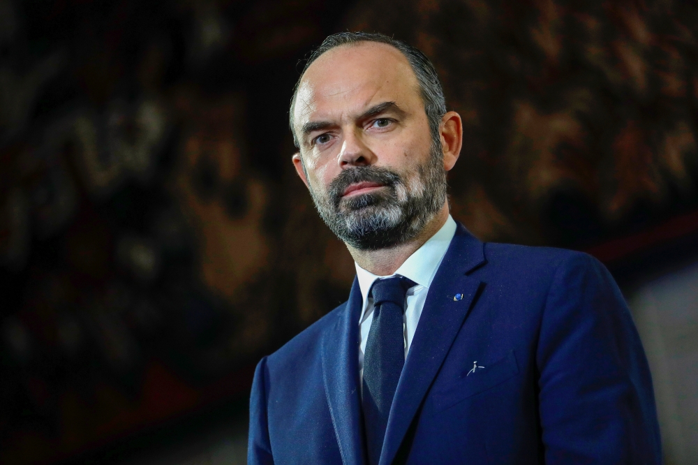 French Prime Minister Edouard Philippe looks on before unveiling the details of a pensions reform plan before the CESE (Economic, Social and Environmental Council) in Paris, France December 11, 2019. Thomas Samson/Pool via Reuters