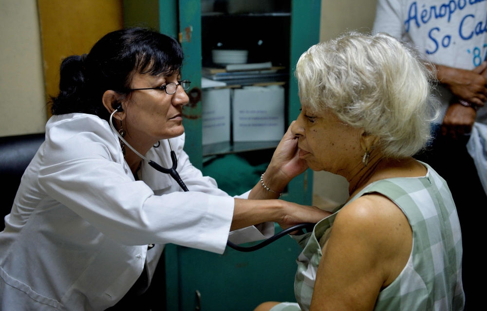 Representative image (Cuban gediatrician Alina Gonzalez, 57, examines an elderly woman at the Longevity Research Center)where she works in Havana on October 11, 2019. AFP / Yamil Lage) 