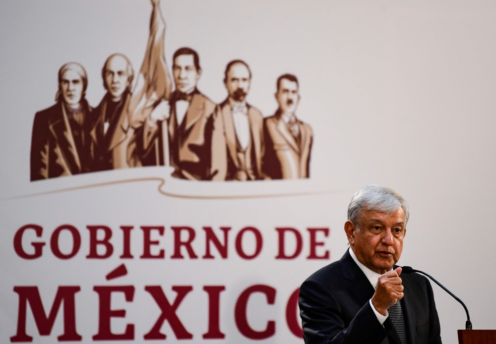 Mexico President Andres Manuel Lopez Obrador delivers a speech before relatives of 43 missing students at the National Palace in Mexico City on December 3, 2018. AFP / Ronaldo Schemidt
