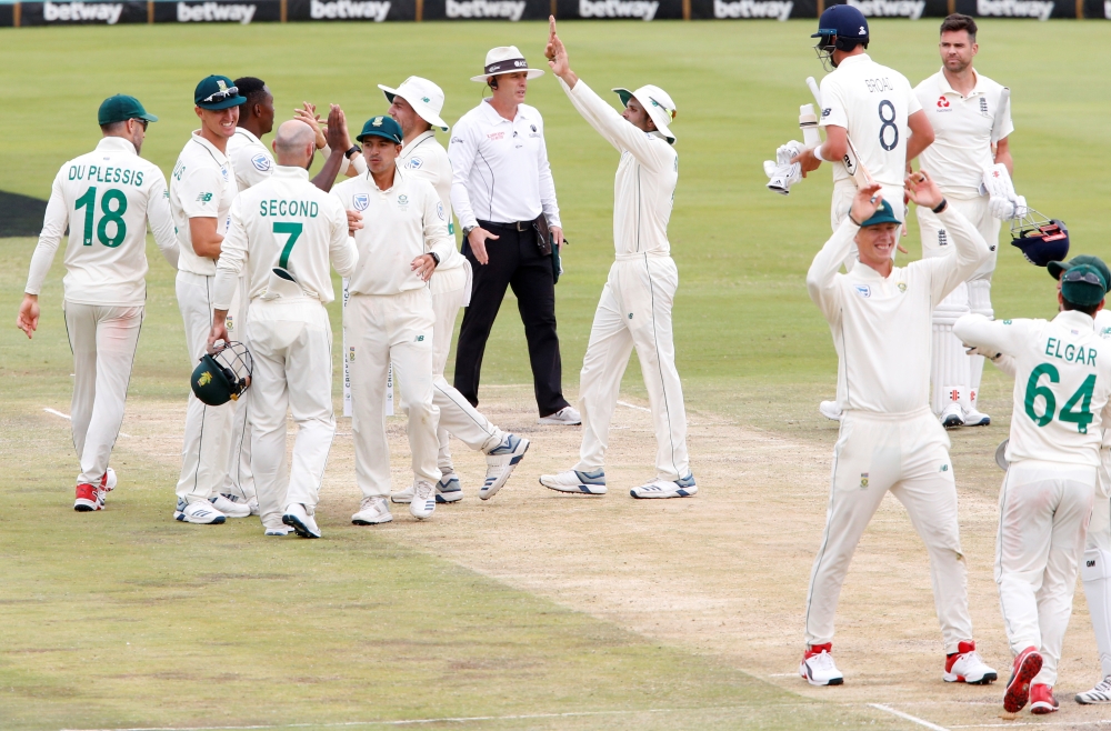 South Africa's Kagiso Rabada and teammates celebrate winning the test match. (REUTERS/Rogan Ward)
