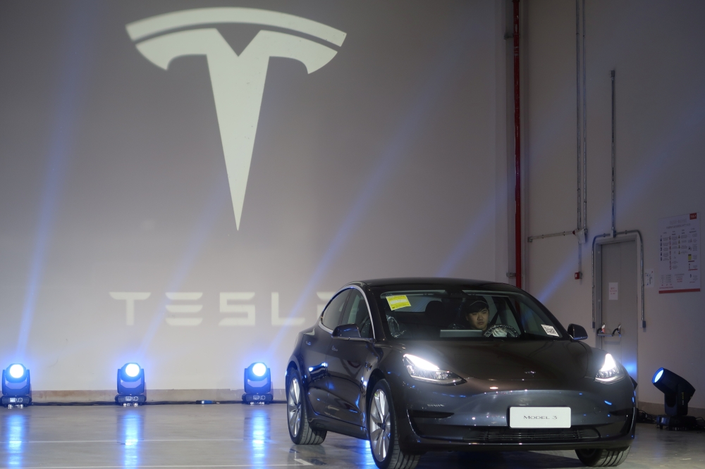 A China-made Tesla Model 3 vehicle is seen at a delivery ceremony in the Shanghai Gigafactory of the U.S. electric car maker in Shanghai, China December 30, 2019. REUTERS/Yilei Sun 