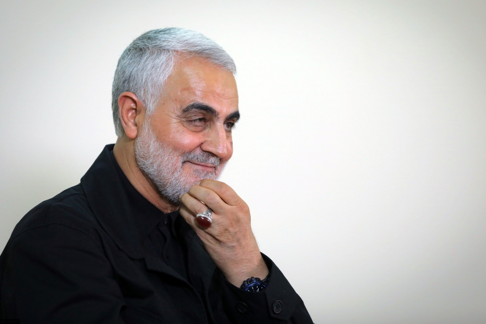 Qasem Soleimani, Iranian Revolutionary Guards Corps (IRGC) Major General and commander of the Quds Force, wearing his trademark ring during an interview with members of the Iranian leader's bureau in Tehran. (file pic/ AFP PHOTO / HO / KHAMENEI.IR)