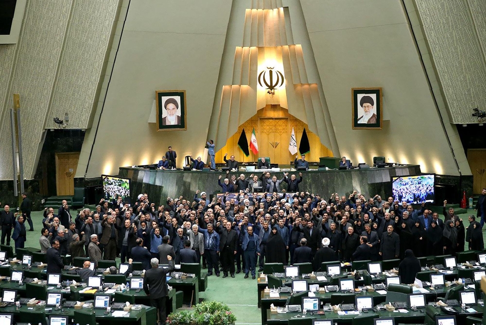 A handout picture provided by the Iranian Parliament news agency on January 5, 2020 shows Iranian MPs chanting