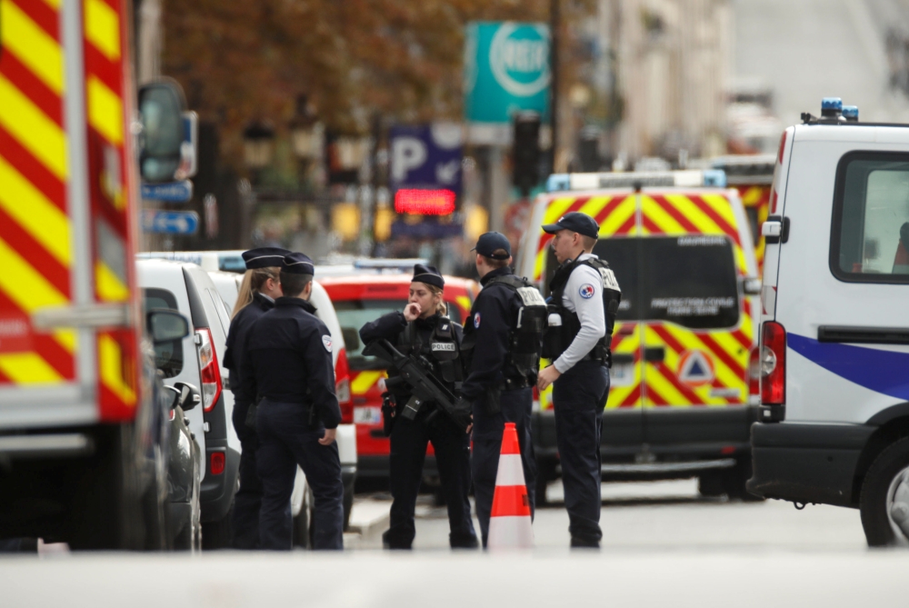 FILE PHOTO: French police is seen in front of the Paris Police headquarters in Paris, France, October 3, 2019. Reuters / Christian Hartmann