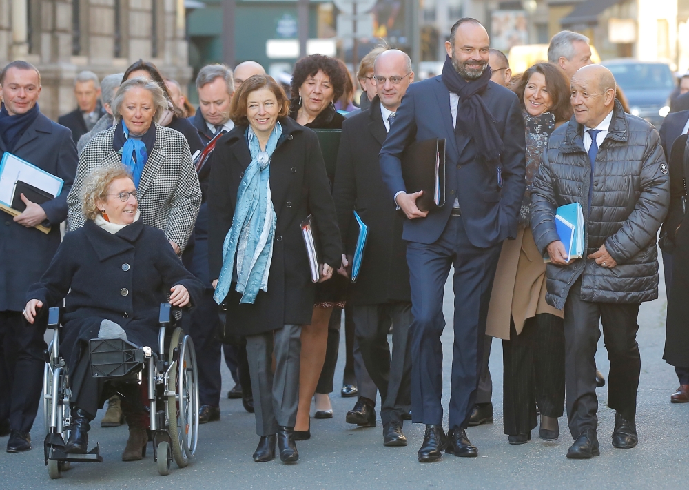 French Prime Minister Edouard Philippe and members of the French government arrive at the Elysee Palace for the first weekly cabinet meeting of the year in Paris, France, January 6, 2020. Michel Euler/Pool via Reuters