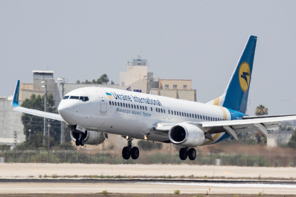 (FILES) In this file photo taken on July 4, 2017 a Boeing 737-3E7 from Ukraine Int. Airlines lands at Israel's Ben Gurion International airport on the outskirts of Tel Aviv. AFP / JACK GUEZ