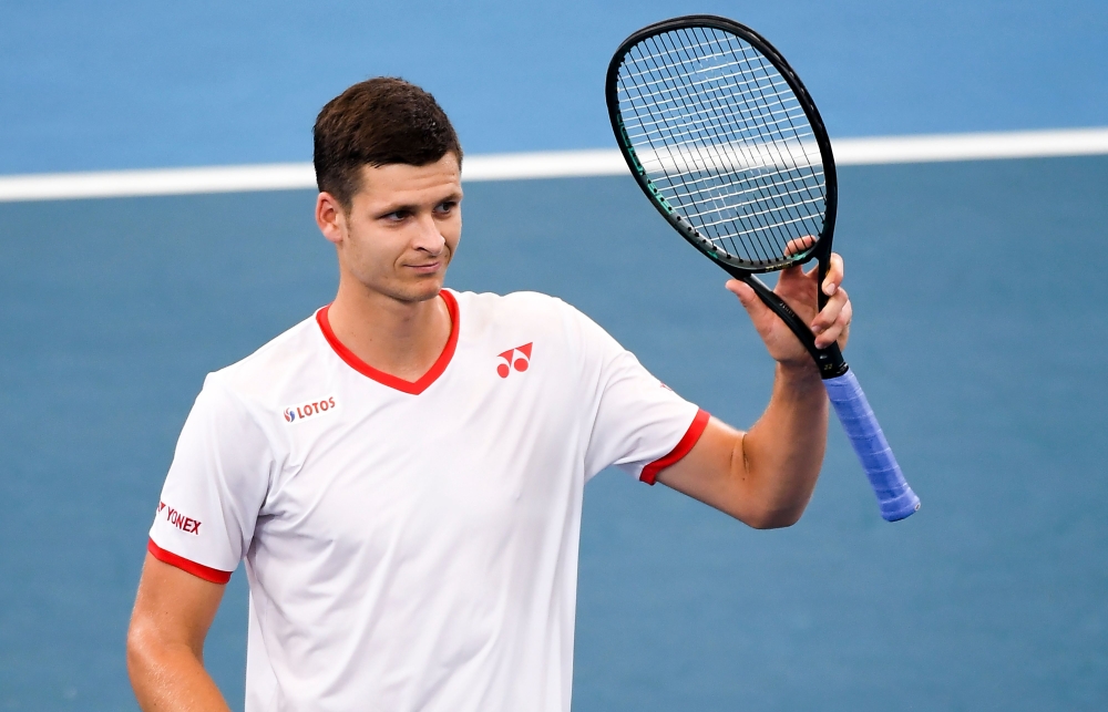 Hubert Hurkacz of Poland reacts after winning against Dominic Thiem of Austria in their men's singles match at the ATP Cup tennis tournament in Sydney on January 8, 2020. AFP / William West 