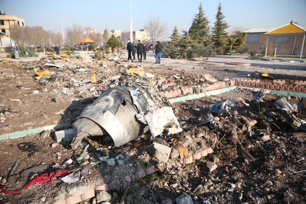Debris of a plane belonging to Ukraine International Airlines, that crashed after taking off from Iran's Imam Khomeini airport, is seen on the outskirts of Tehran, Iran January 8, 2020. Nazanin Tabatabaee/WANA (West Asia News Agency) via Reuters