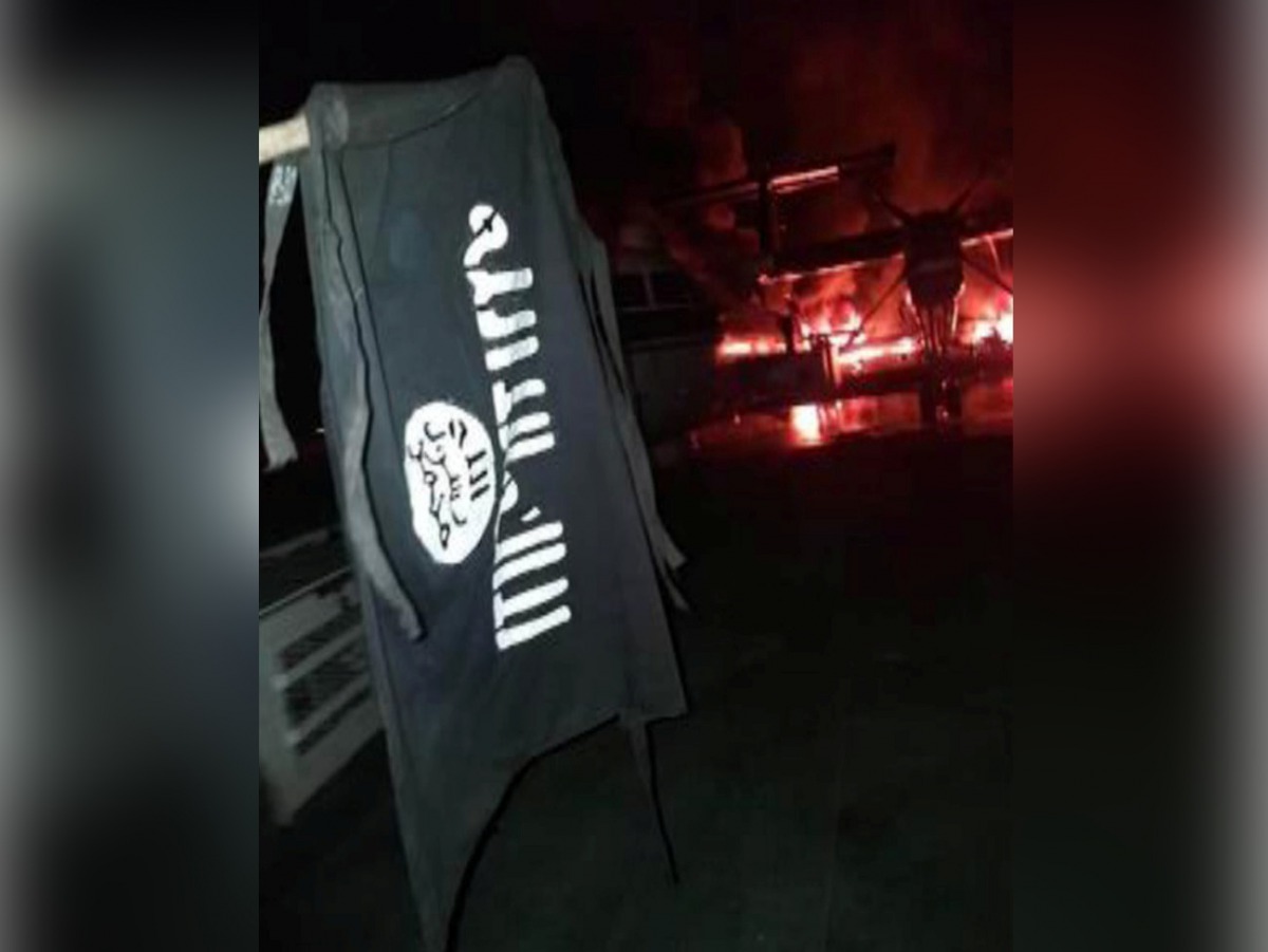 An image distributed by al Shabaab after the attack on a military base in Kenya shows Somalia's al Shabaab militant group's flag, said to be at the Manda Bay Airfield in Manda, Lamu, Kenya January 5, 2020. Al-Shabaab/Handout via Reuters