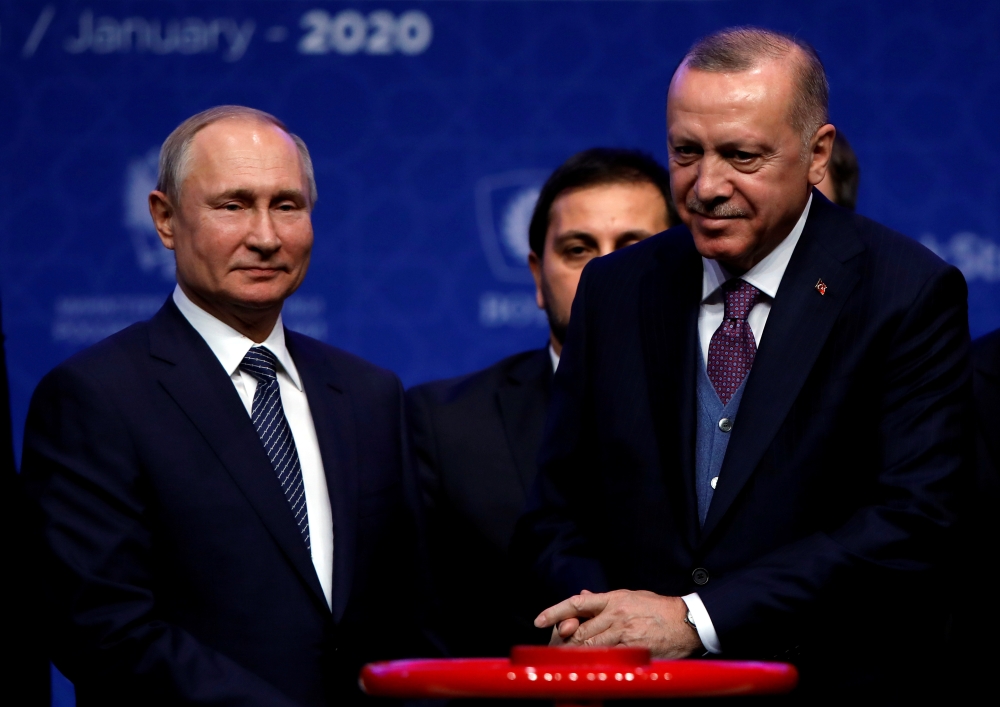 Turkish President Tayyip Erdogan and Russian President Vladimir Putin attend a ceremony marking the formal launch of the TurkStream pipeline which will carry Russian natural gas to southern Europe through Turkey, in Istanbul, Turkey, January 8, 2020. Reut