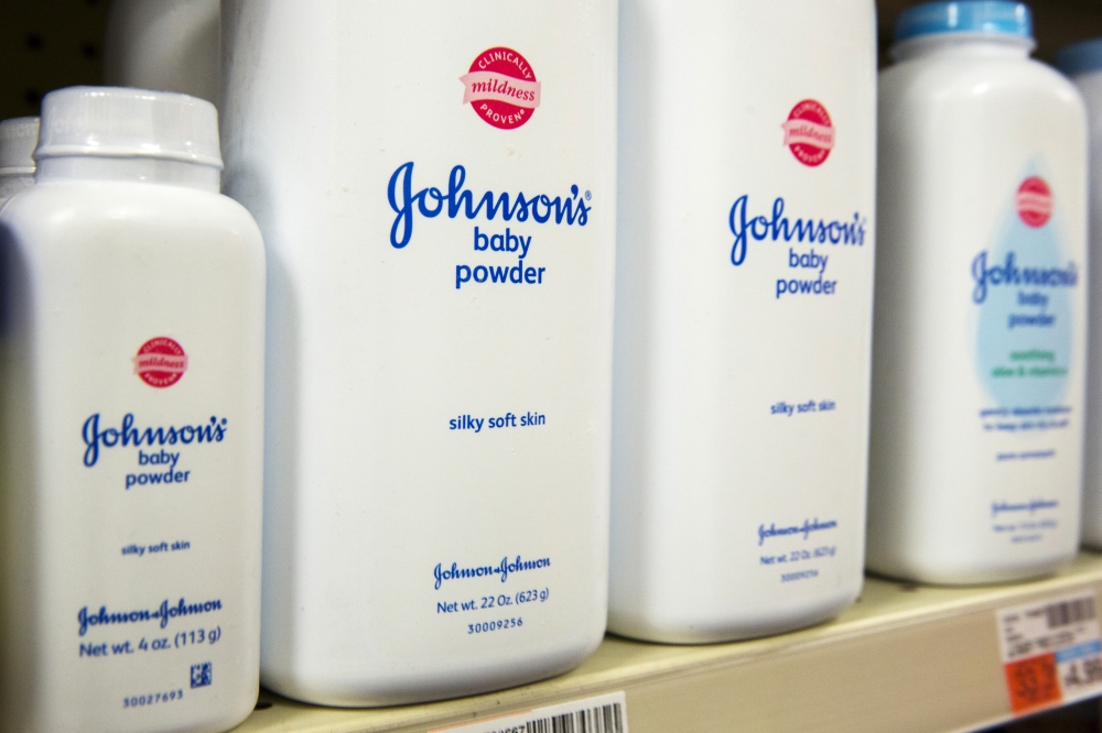 Bottles of Johnson & Johnson baby powder line a drugstore shelf in New York October 15, 2015. Reuters / Lucas Jackson