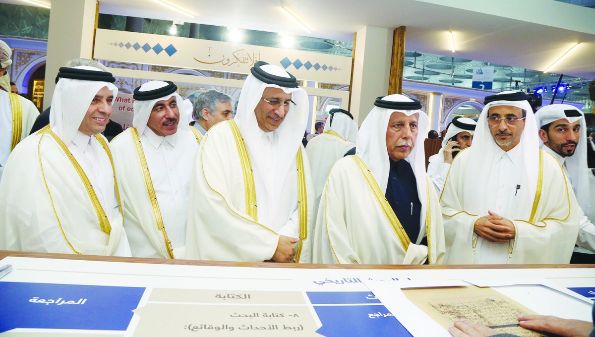 Shura Council Speaker H E Ahmed bin Abdullah bin Zaid Al Mahmoud and Ministers visiting a stall at the 30th Doha International Book Fair at Doha Exhibition Conference Center (DECC), yesterday.
