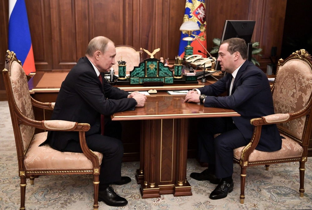 Russian President Vladimir Putin meets with Prime Minister Dmitry Medvedev in Moscow on January 15, 2020. / AFP / Sputnik / Alexey NIKOLSKY