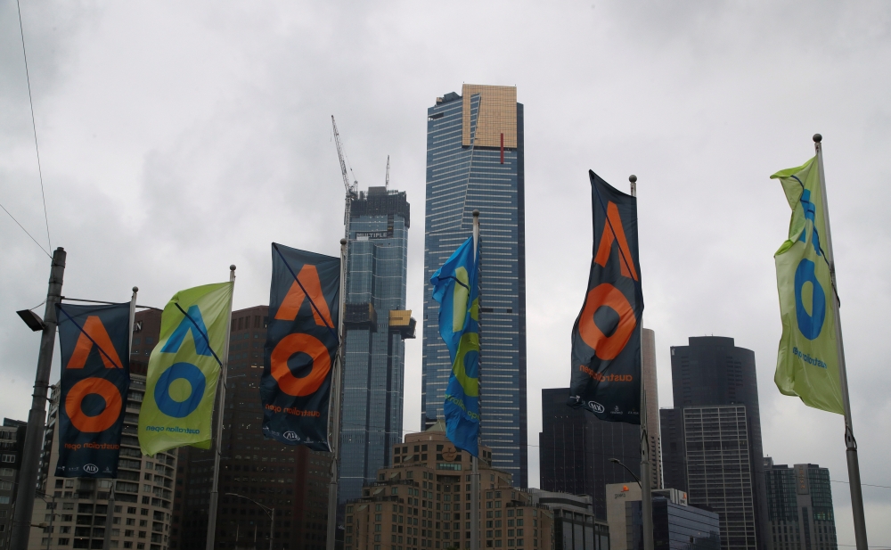 General view of flags infront of the Melbourne Skyline REUTERS/Ciro De Luca