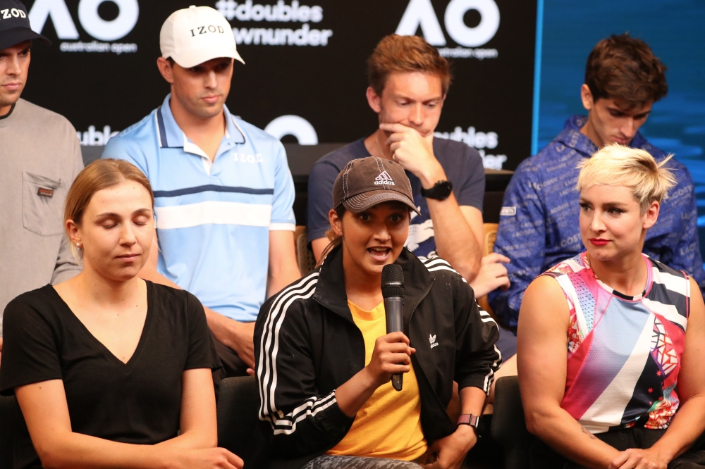 Sania mirza (C) of India with Ukraine's Nadiia Kichenok (L) and Bethanie Mattek-Sands of the US attend a press conference ahead of the Australian Open tennis tournament in Melbourne on January 19, 2020./ AFP / DAVID GRAY 
