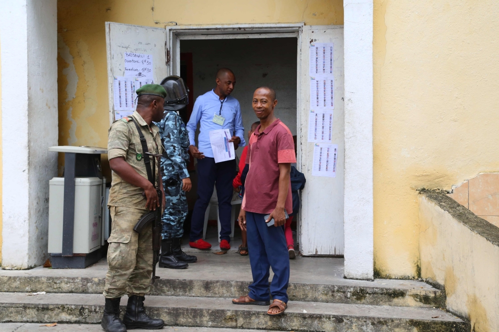 Comoros soldiers are seen in front of a polling station in the Badjanani neighbourhood in Moroni on January 19, 2020. AFP / Ibrahim Youssouf
 