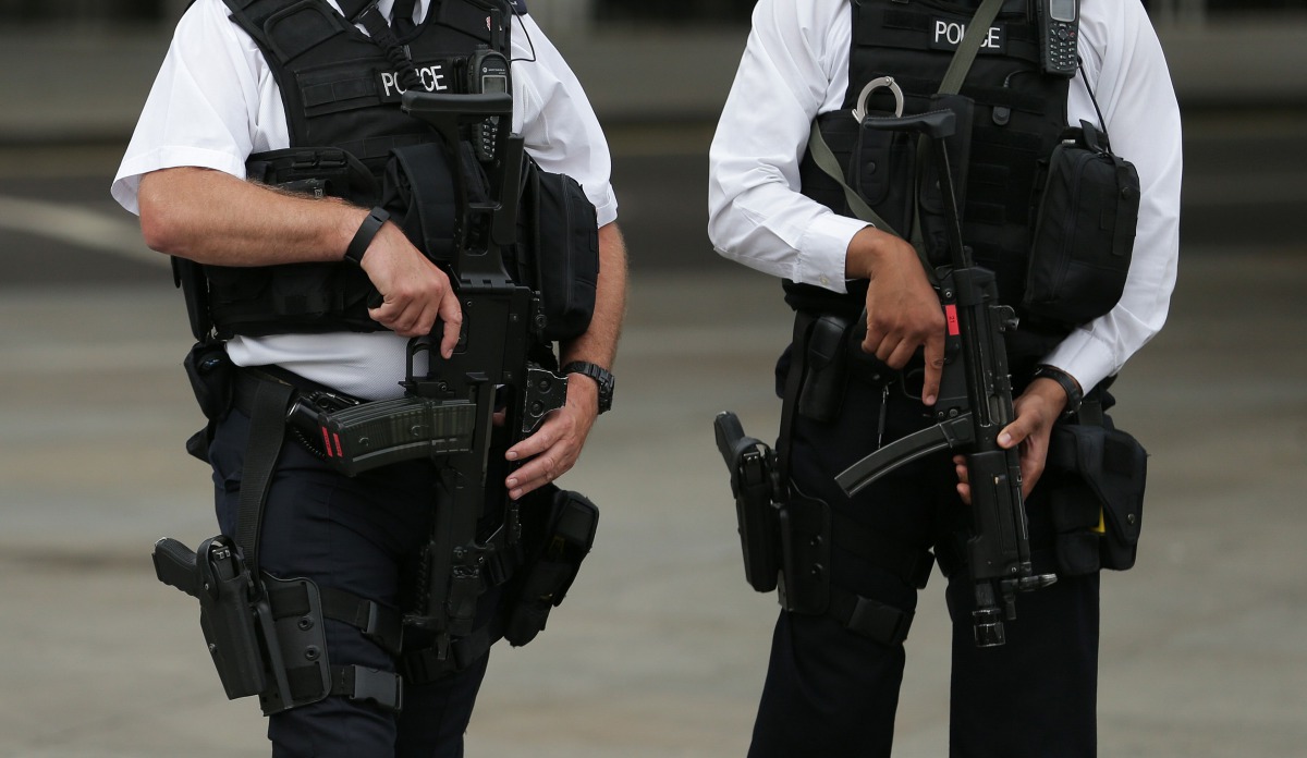 Armed police personnel patrol near London's Trafalgar Square on August 4, 2016. AFP
