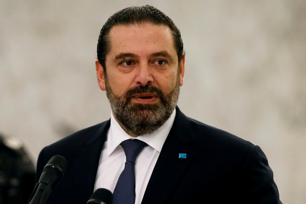 FILE PHOTO: Lebanon's caretaker Prime Minister Saad al-Hariri speaks after meeting with President Michel Aoun at the presidential palace in Baabda, Lebanon November 7, 2019. REUTERS/Mohamed Azakir