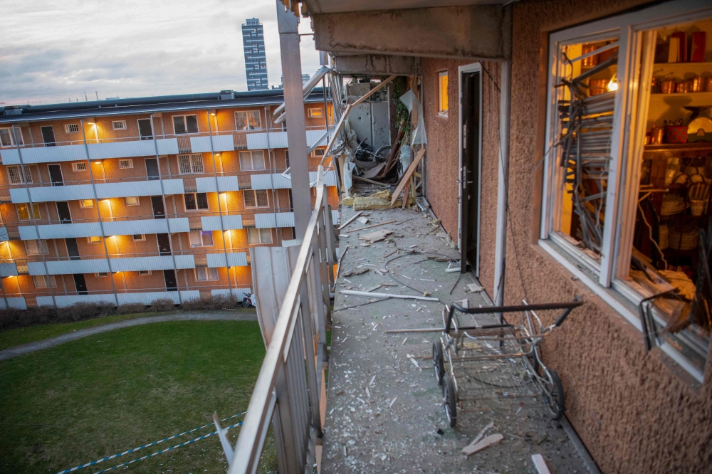 Viex of some debris on the balcony of a residential building that was hit by an explosion injuring one person in Husby outside of Stockholm, on January 21, 2020, where two blasts occurred within some minutes and a few hundred metres away one from each oth