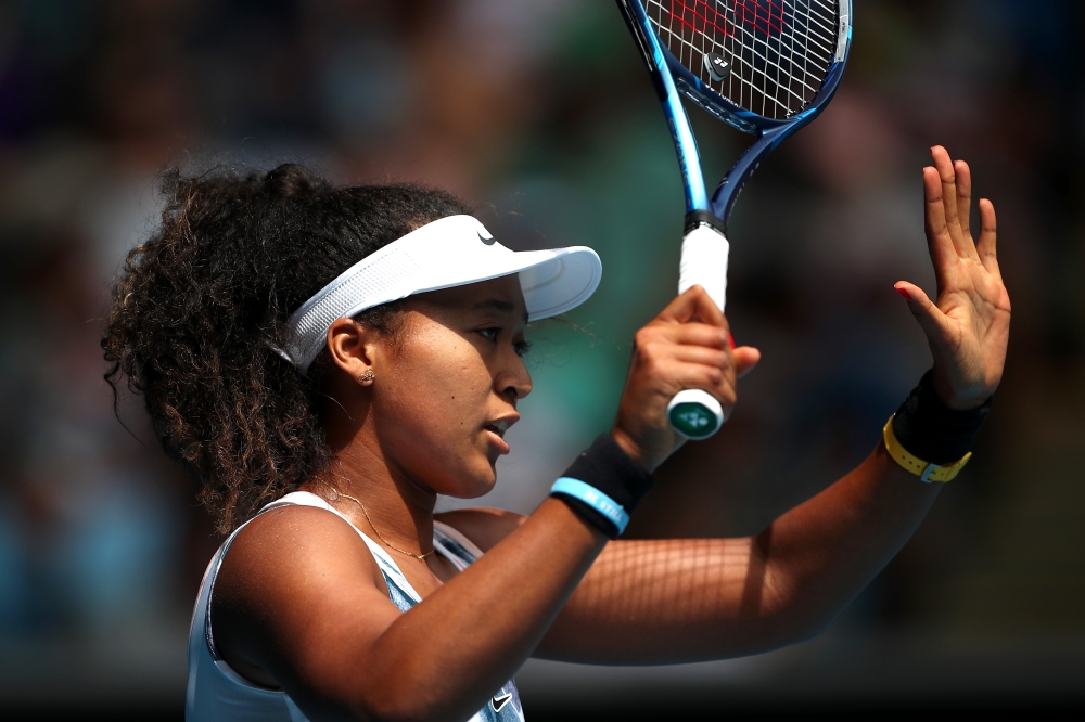  Australian Open - Second Round - Melbourne Park, Melbourne, Australia - January 22, 2020 Japan's Naomi Osaka reacts during the match against China's Saisai Zheng REUTERS/Hannah Mckay 