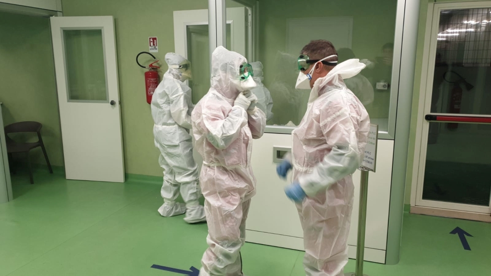 Medical personnel at Rome's Fiumicino airport prepare to check passengers arriving from China's Wuhan for signs of coronavirus in Rome, Italy, January 23, 2020. Aeroporti di Roma (AdR)/Handout via REUTERS
