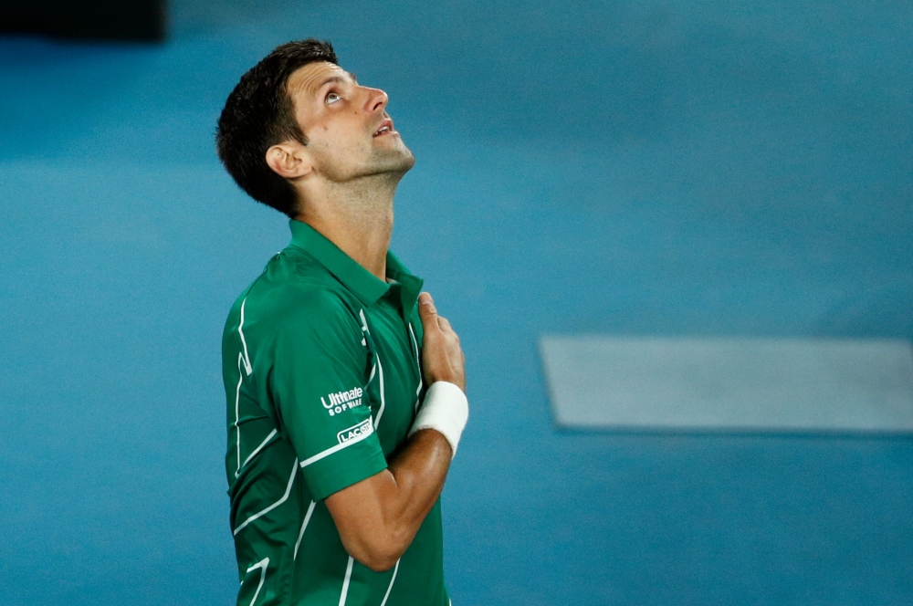  Serbia's Novak Djokovic reacts after his match against Canada's Milos Raonic. REUTERS/Edgar Su