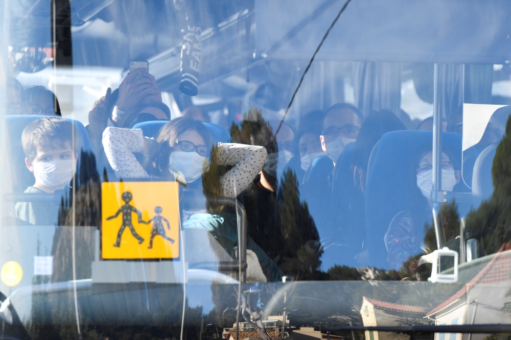 A vehicle believed to contain French citizens after their evacuation from the Chinese city of Wuhan, arrives at The Vacanciel Holiday Resort in Carry-le-Rouet, near Marseille, southern France on January 31, 2020, following their repatriation from the coro