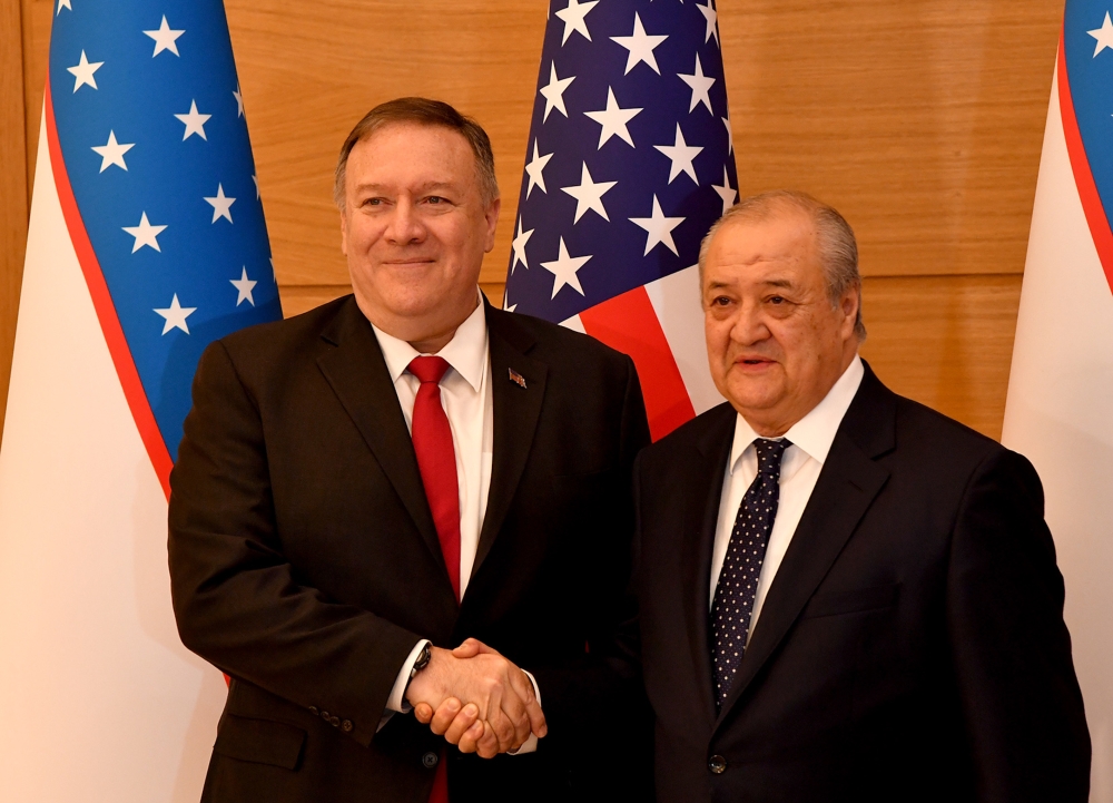 Uzbekistani Foreign Minister Abdulaziz Kamilov (R) shakes hands with US Secretary of State Mike Pompeo prior to their meeting in Tashkent, Uzbekistan on February 03, 2020. (Anvar Ilyasov / Uzbekistani Foreign Ministry handout / Anadolu Agency ) 
 
 