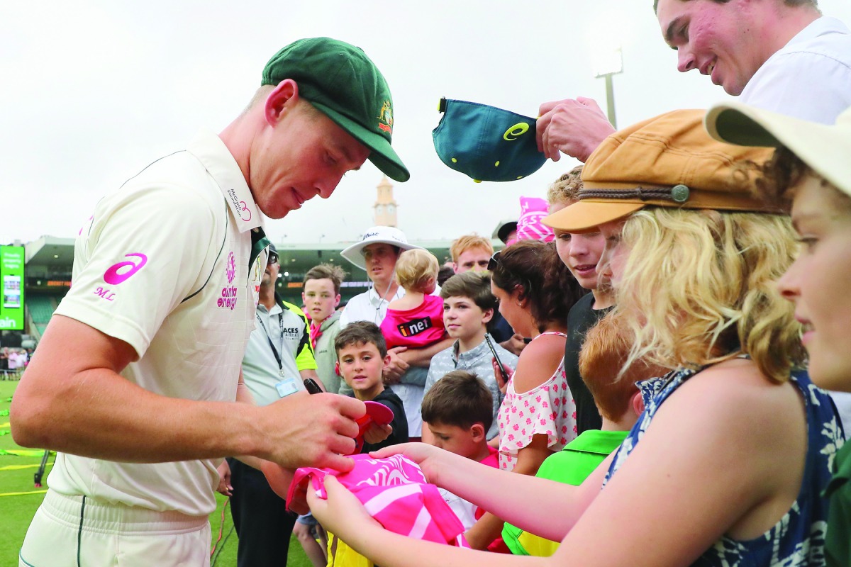 Australia’s Marnus Labuschagne signs autographs in this January 6, 2020 file picture.