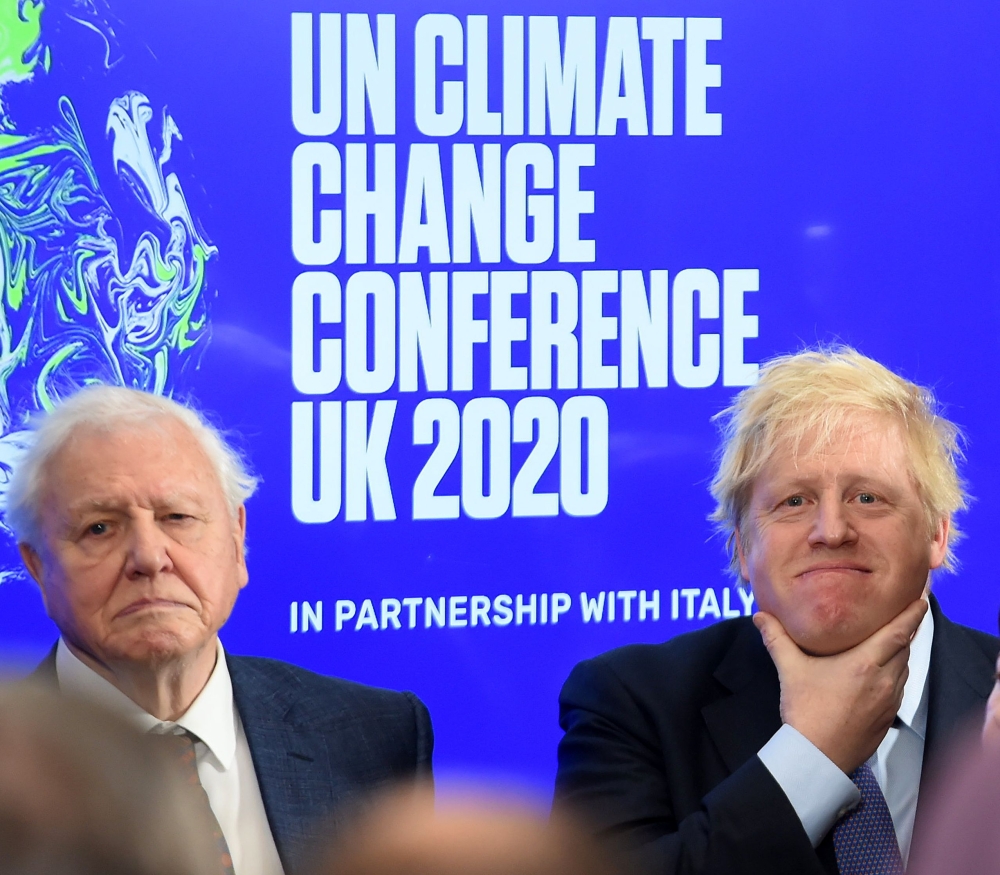 Boris Johnson and David Attenborough attend an event to launch the United Nations Climate Change conference, COP26, in central London on February 4, 2020. AFP / Jeremy Selwyn 