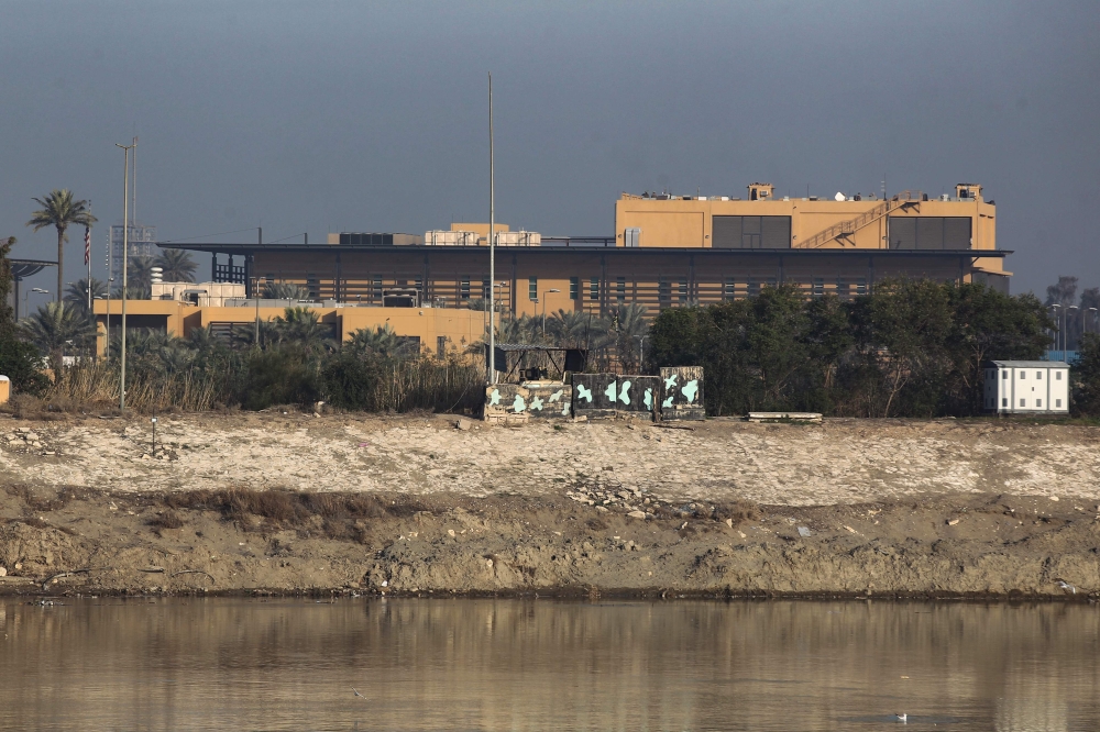 (FILES) In this file photo taken on January 03, 2020, a view of the US embassy across the Tigris river in Iraq's capital Baghdad.  AFP / AHMAD AL-RUBAYE
