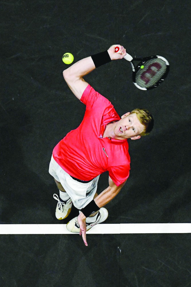  Kyle Edmund of Great Britain serves the ball during his Men's Singles final match against Andreas Seppi of Italy on day seven of the 2020 NY Open at Nassau Veterans Memorial Coliseum on February 16, 2020 in Uniondale, New York. Steven Ryan/Getty Images/A