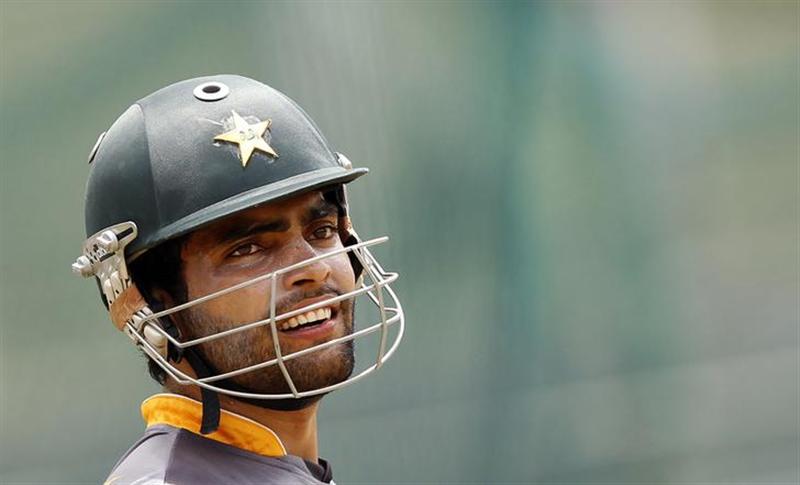 Pakistan's Umar Akmal attends a practice session ahead of their Twenty 20 World Cup cricket match against Bangladesh in Pallekele September 24, 2012. REUTERS/Dinuka Liyanawatte
