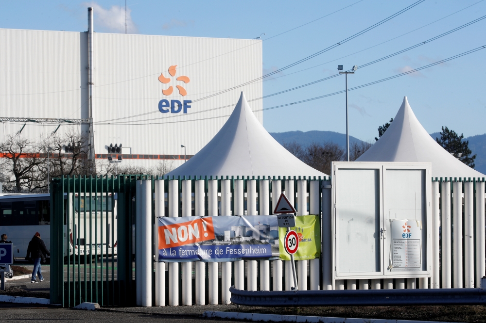 A banner is seen on a fence at France's oldest Electricite de France (EDF) nuclear power plant near the eastern French village of Fessenheim, France February 20, 2020. The banner reads: 
